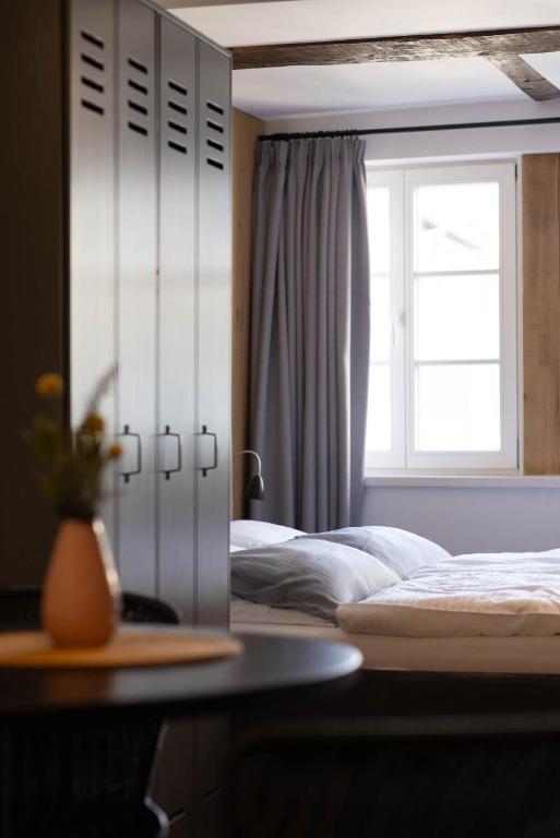 Postel nebo postele na pokoji v ubytování Wertschätzer Hotel - Krumme Str
