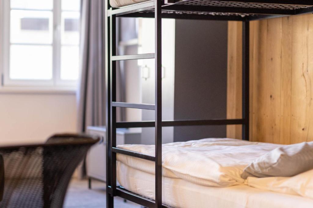 Postel nebo postele na pokoji v ubytování Wertschätzer Hotel - Krumme Str