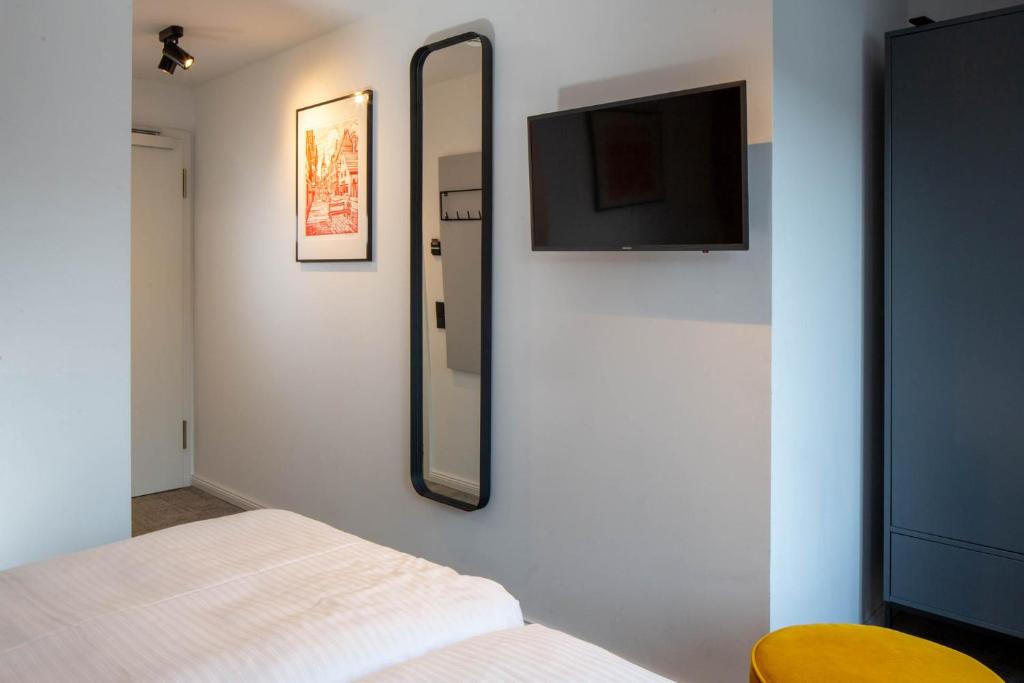 TV a/nebo společenská místnost v ubytování Wertschätzer Hotel - Krumme Str