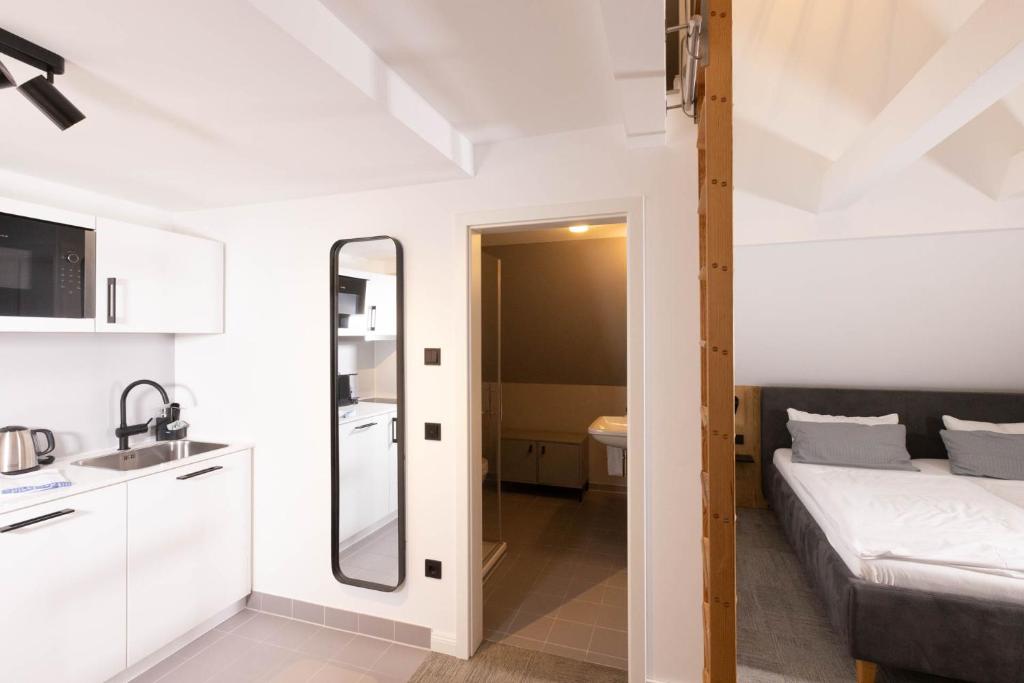 Postel nebo postele na pokoji v ubytování Wertschätzer Hotel - Krumme Str