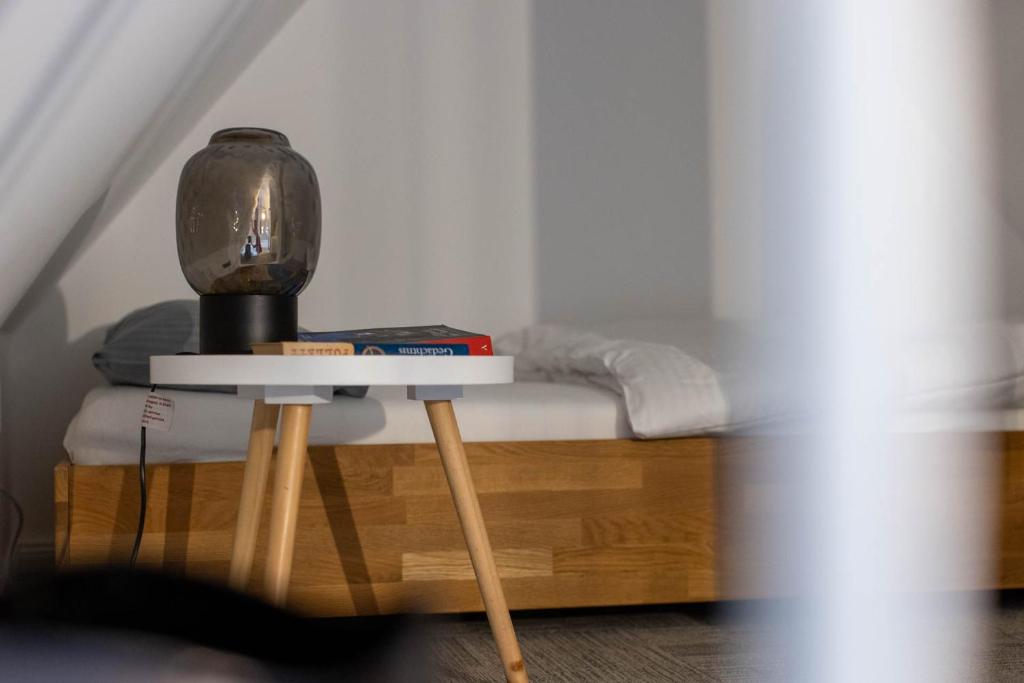 Postel nebo postele na pokoji v ubytování Wertschätzer Hotel - Krumme Str