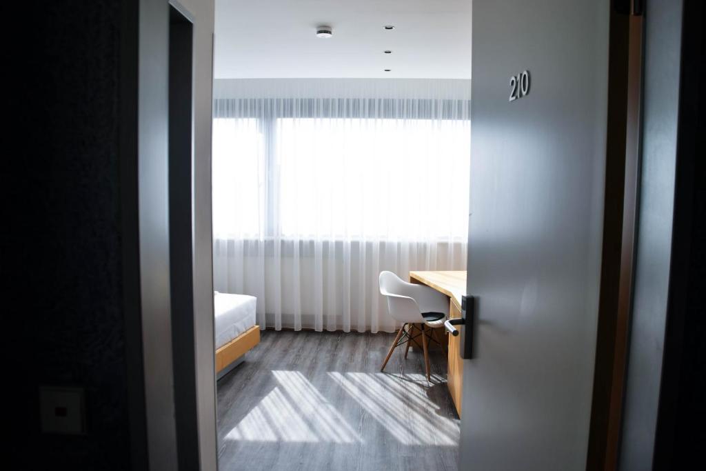 Postel nebo postele na pokoji v ubytování Cristall Hotel