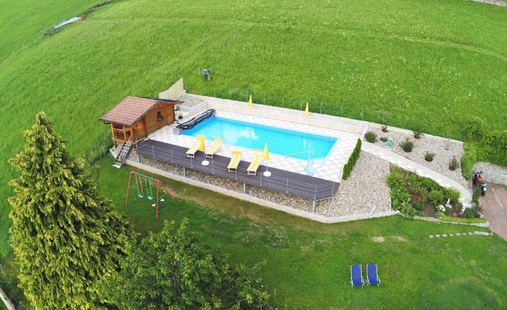 Bazén v ubytování Hotel Garni Alpes nebo v jeho okolí