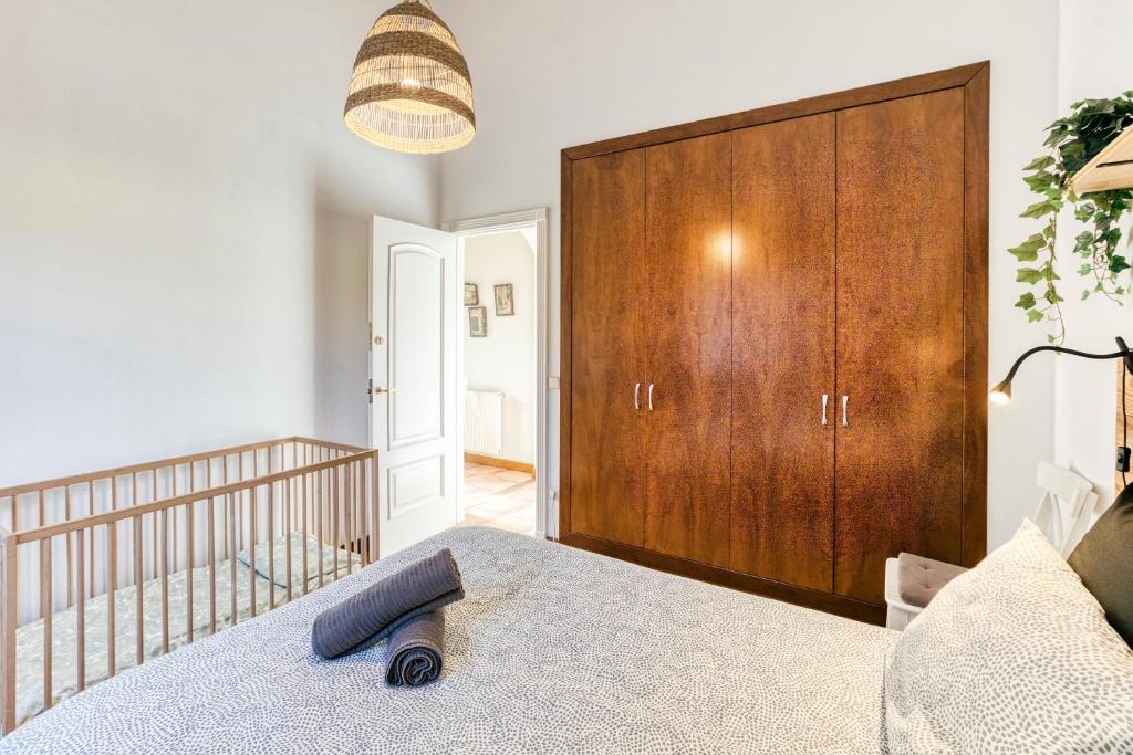 Postel nebo postele na pokoji v ubytování Can Maximino