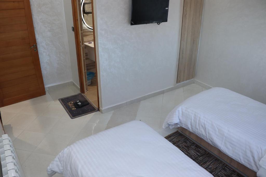 Postel nebo postele na pokoji v ubytování VANA hôtel