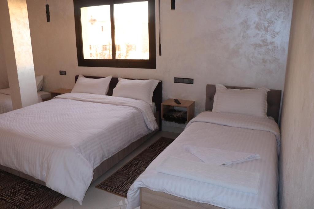 Postel nebo postele na pokoji v ubytování VANA hôtel