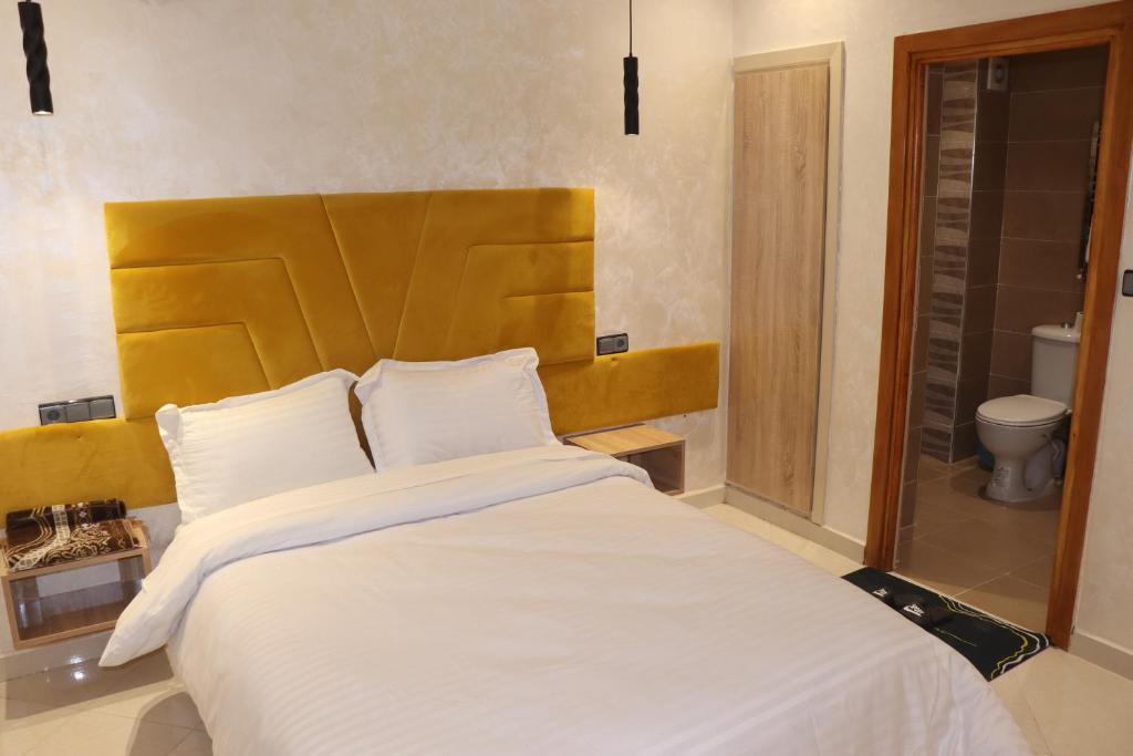 Postel nebo postele na pokoji v ubytování VANA hôtel