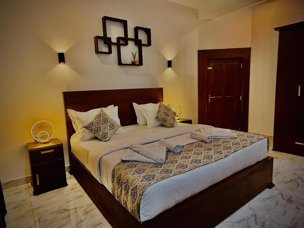 Postel nebo postele na pokoji v ubytování Aloe Transit Hotel