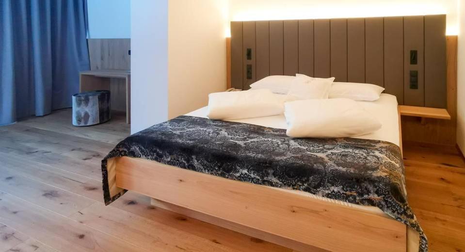 Postel nebo postele na pokoji v ubytování Hotel Eller