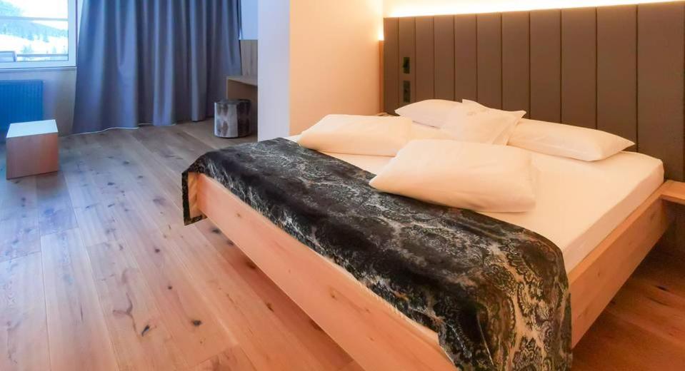 Postel nebo postele na pokoji v ubytování Hotel Eller