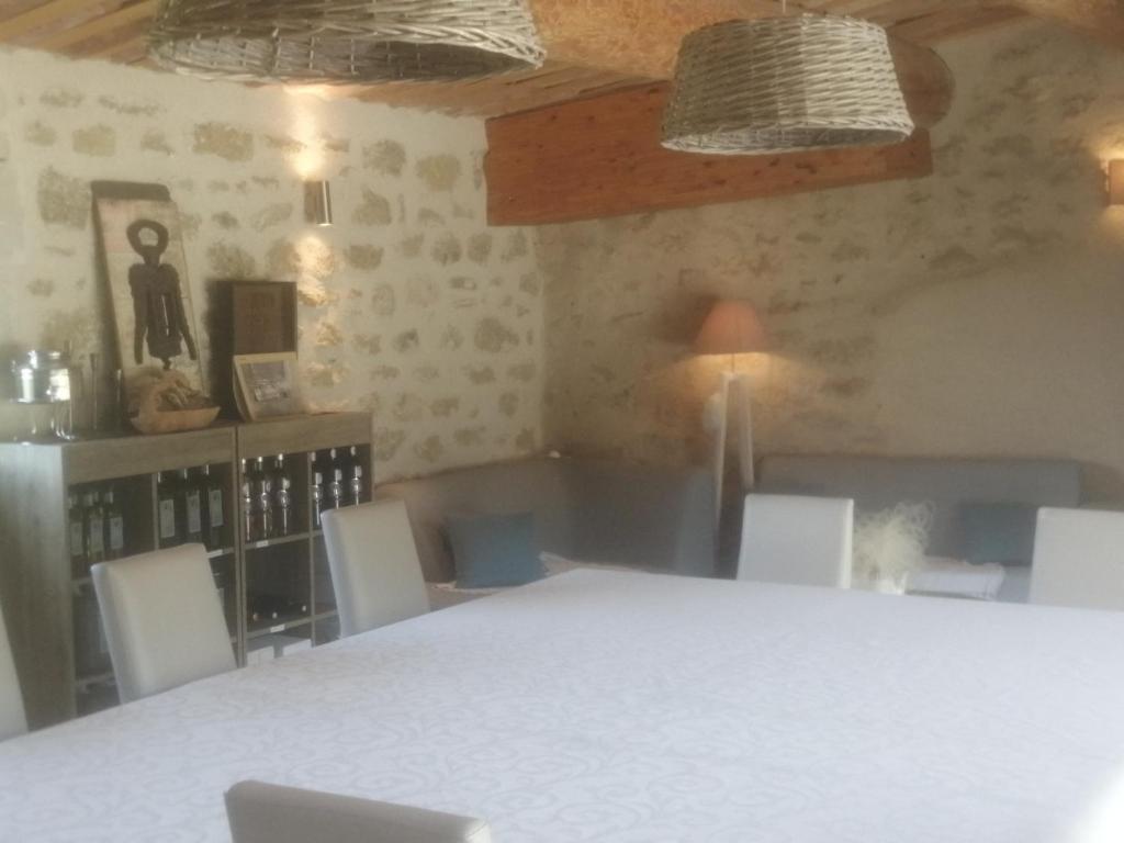 Postel nebo postele na pokoji v ubytování Chambres d'hôtes Le Vignoble