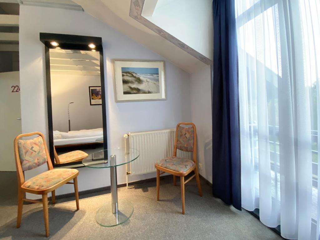 REGIOHOTEL Wittekind Burg - #AutobahnA2 #TopPreisLeistung #FreeParking #Wallbox - Eenpersoonskamer Met Balkon