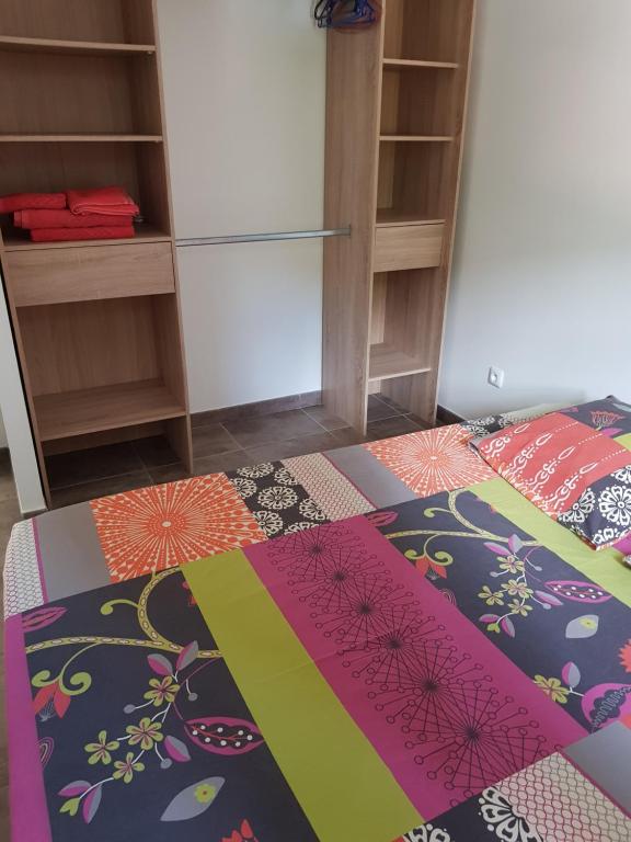 Postel nebo postele na pokoji v ubytování LA YOLE des Caraïbes