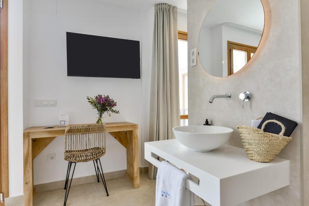 a bathroom with a sink and a mirror at MIMAR ALTEA ROOMS - Tranquil in Altea