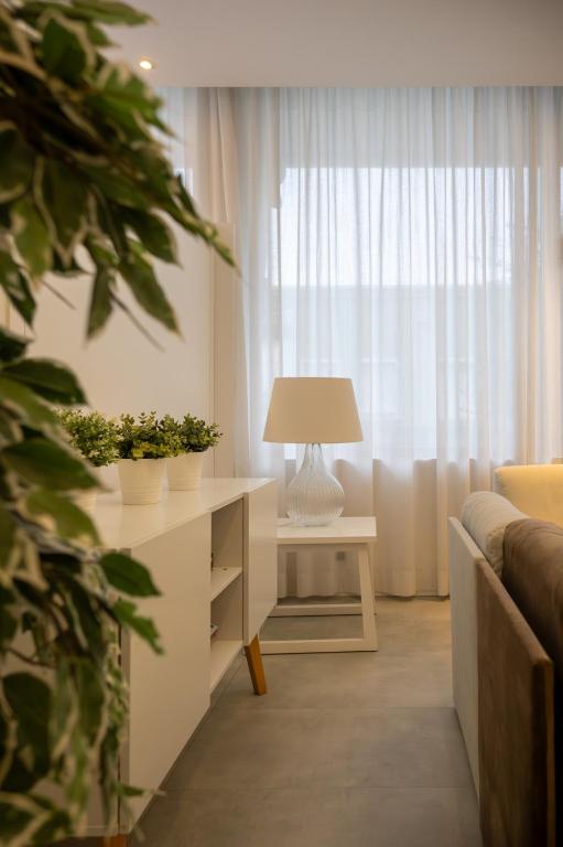 Postel nebo postele na pokoji v ubytování Hotel Savoy