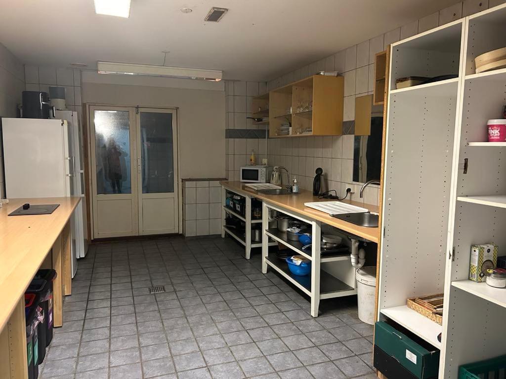 Kuchyň nebo kuchyňský kout v ubytování Hostel Mors