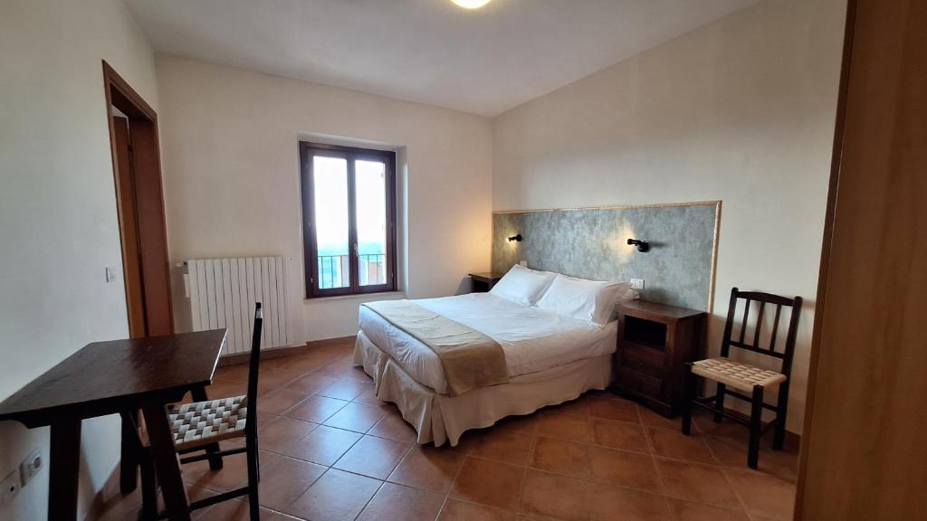 Postel nebo postele na pokoji v ubytování Hotel Monastero Sant'Andrea