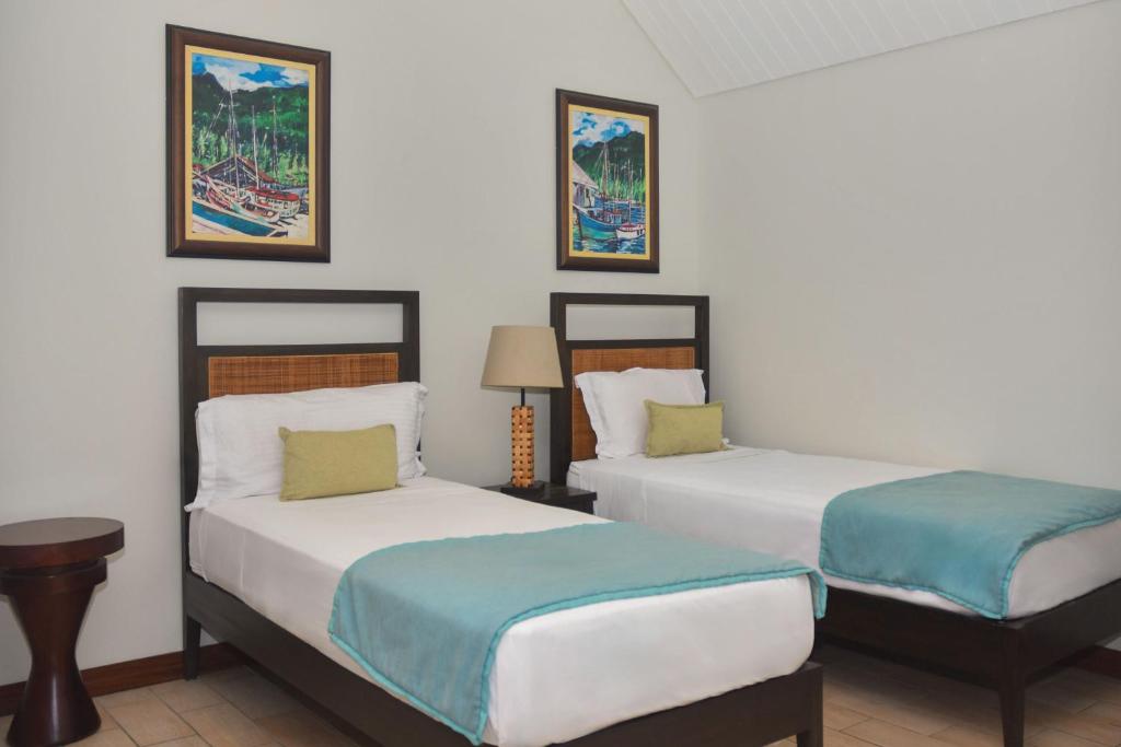 Postel nebo postele na pokoji v ubytování Eden Island by Olala Homes