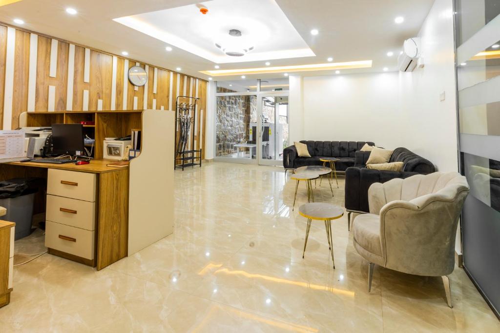 Kuchyň nebo kuchyňský kout v ubytování Cascadia Apartments Kigali