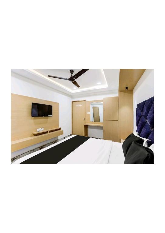 TV a/nebo společenská místnost v ubytování Hotel Prime 24