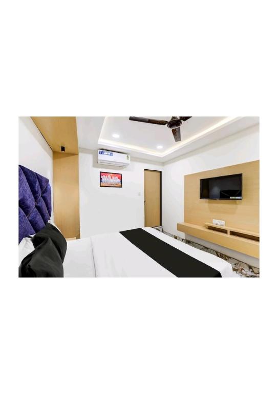 TV a/nebo společenská místnost v ubytování Hotel Prime 24