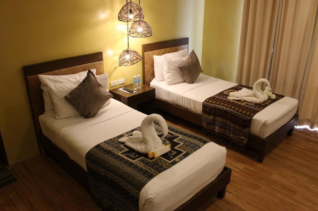 Postel nebo postele na pokoji v ubytování Alunsina Hotel and Spa