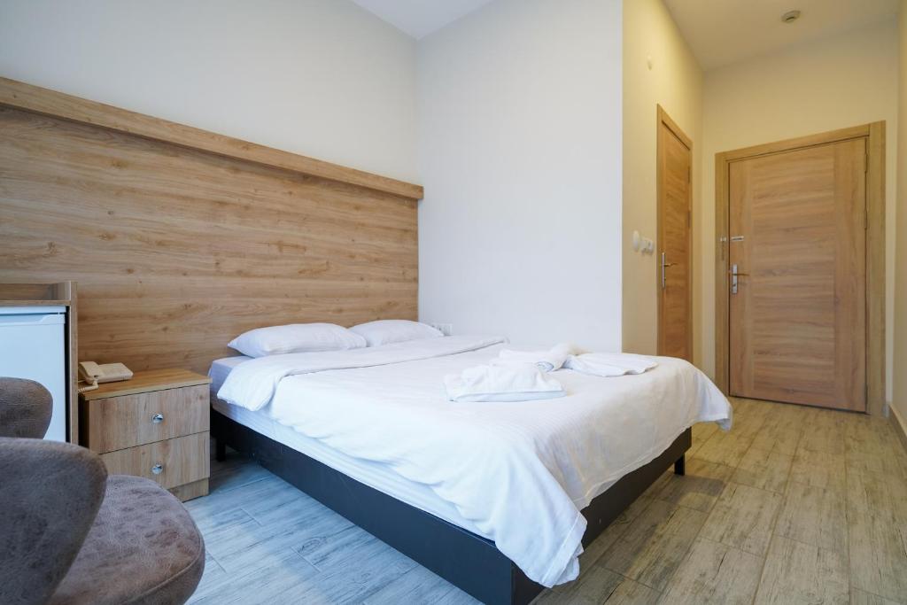 Postel nebo postele na pokoji v ubytování Askoroz Otel İzmit