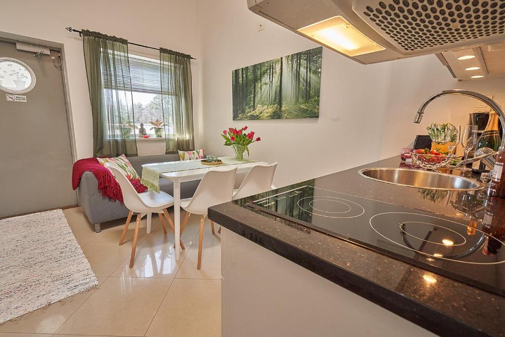 Posezení v ubytování Staylong Hotell