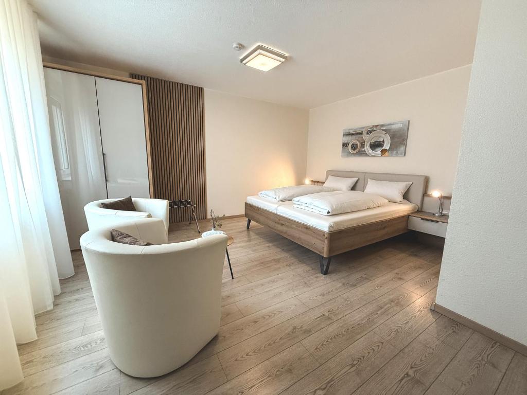 Postel nebo postele na pokoji v ubytování Hotel Restaurant Alt Pirmasens