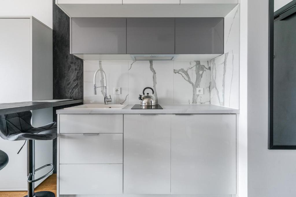 Kuchyň nebo kuchyňský kout v ubytování Littleheaven Studia & Apartmenty