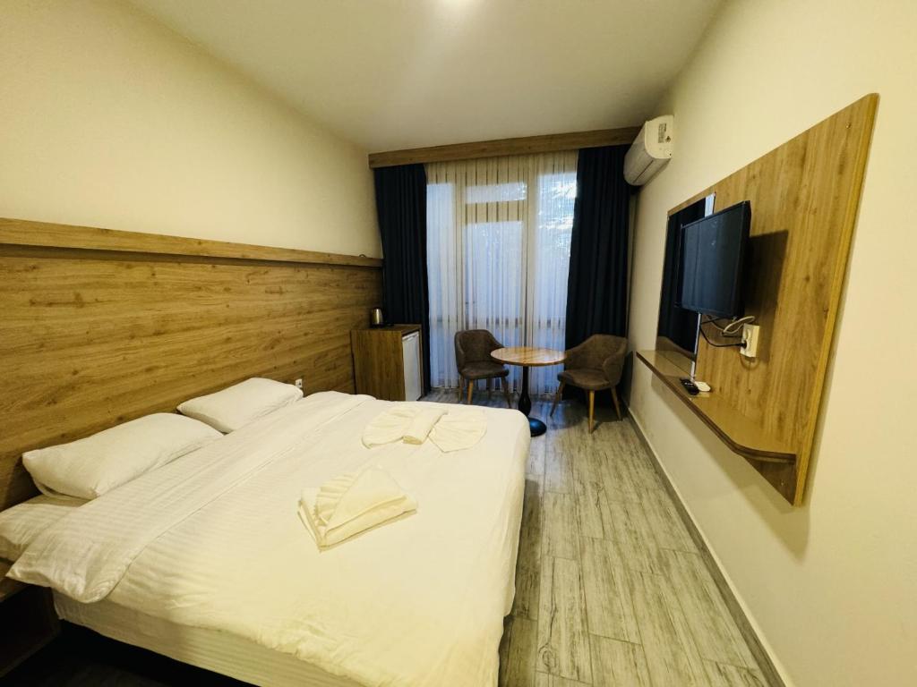 Postel nebo postele na pokoji v ubytování Askoroz Otel İzmit