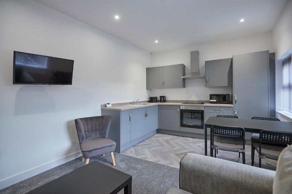 Kuchyň nebo kuchyňský kout v ubytování Zetland House Apartment 5 Loftus