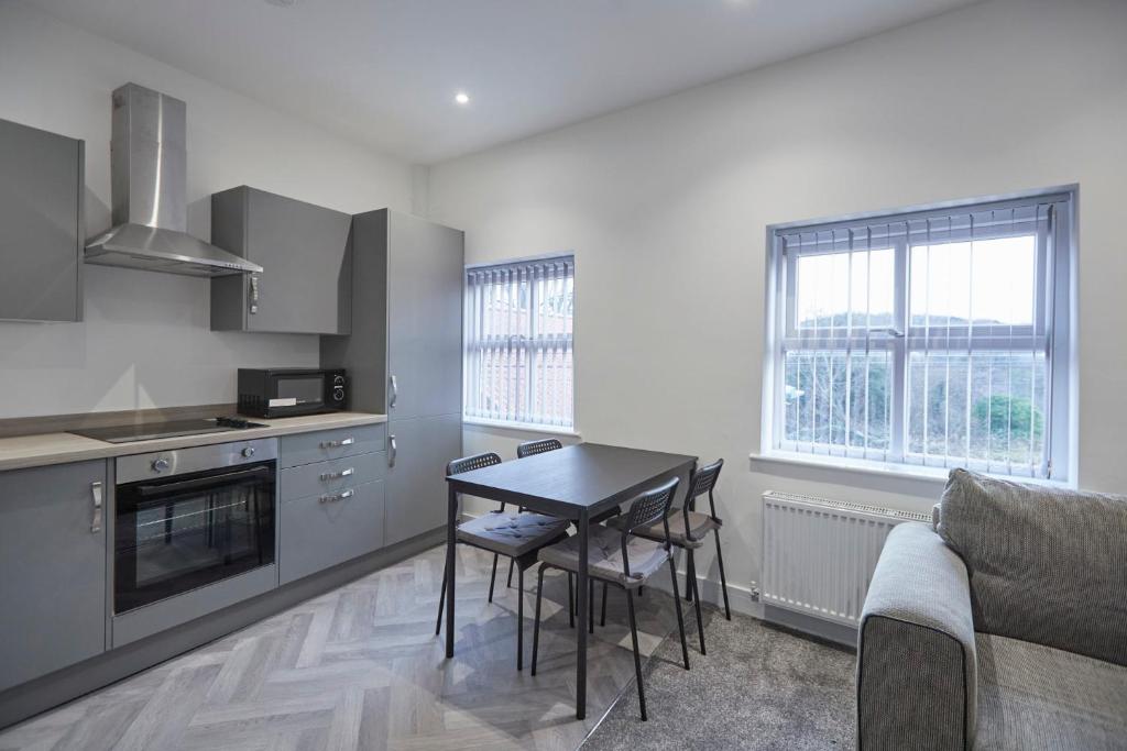 Kuchyň nebo kuchyňský kout v ubytování Zetland House Apartment 5 Loftus