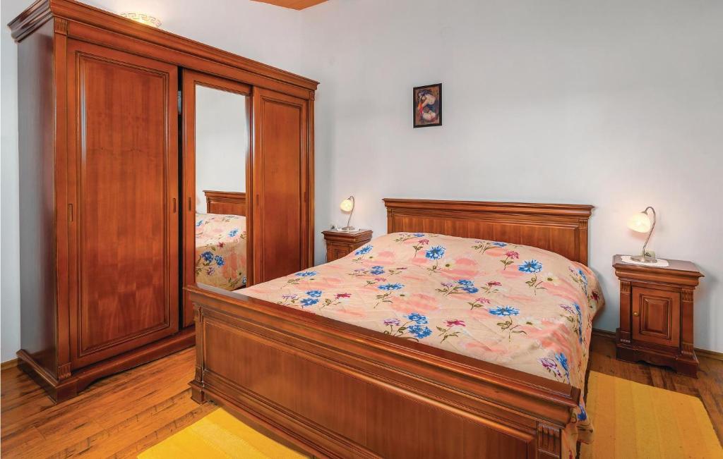 Postel nebo postele na pokoji v ubytování Holiday Home Reburici I