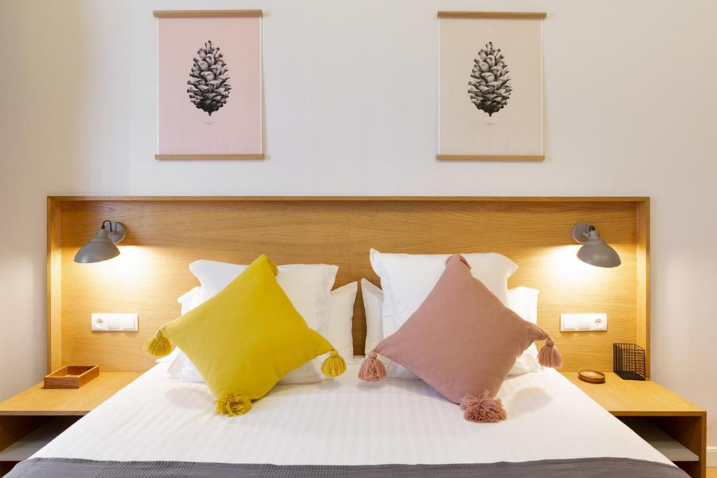 Postel nebo postele na pokoji v ubytování Central Apartments Barcelona