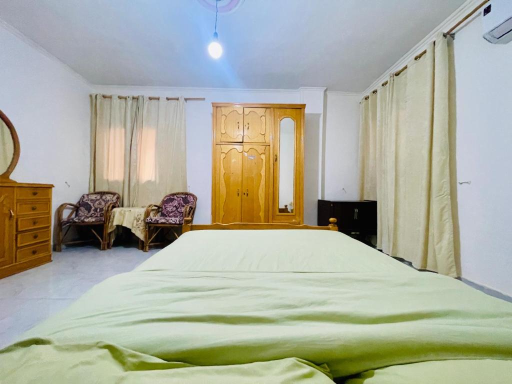 Postel nebo postele na pokoji v ubytování Jiamu House 嘉木旅居