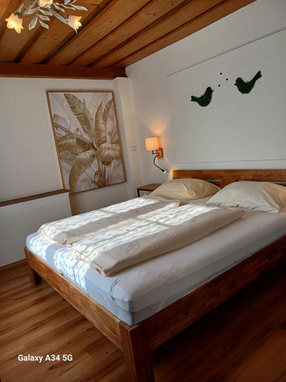 Posteľ alebo postele v izbe v ubytovaní Haus am Moos