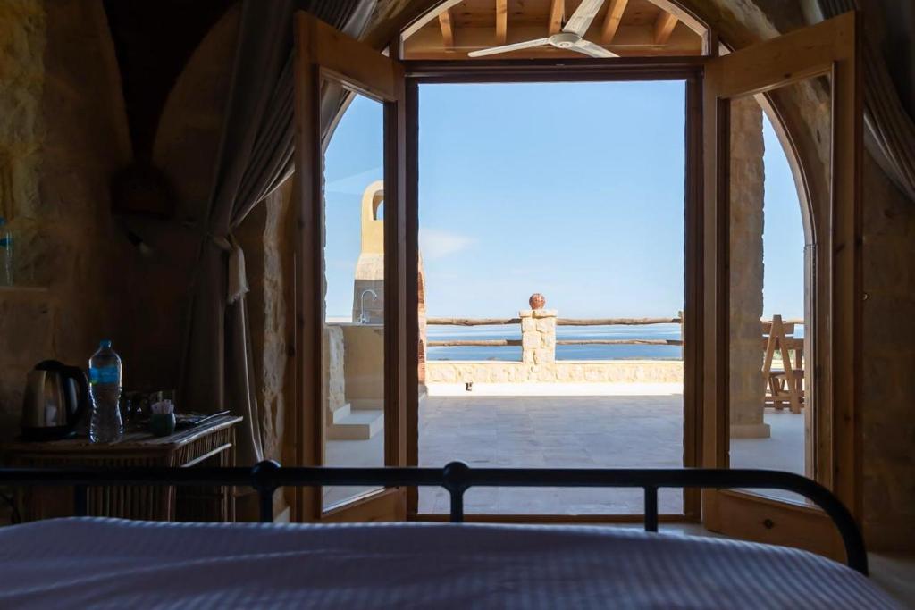 Postel nebo postele na pokoji v ubytování Hoopoe lodge