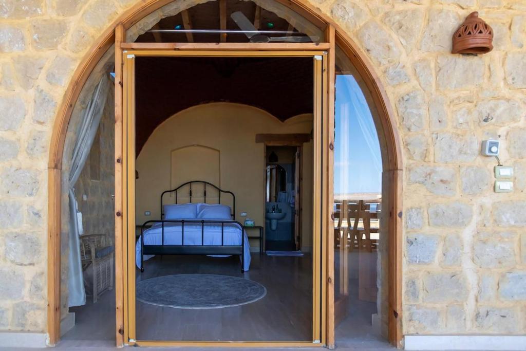 Postel nebo postele na pokoji v ubytování Hoopoe lodge