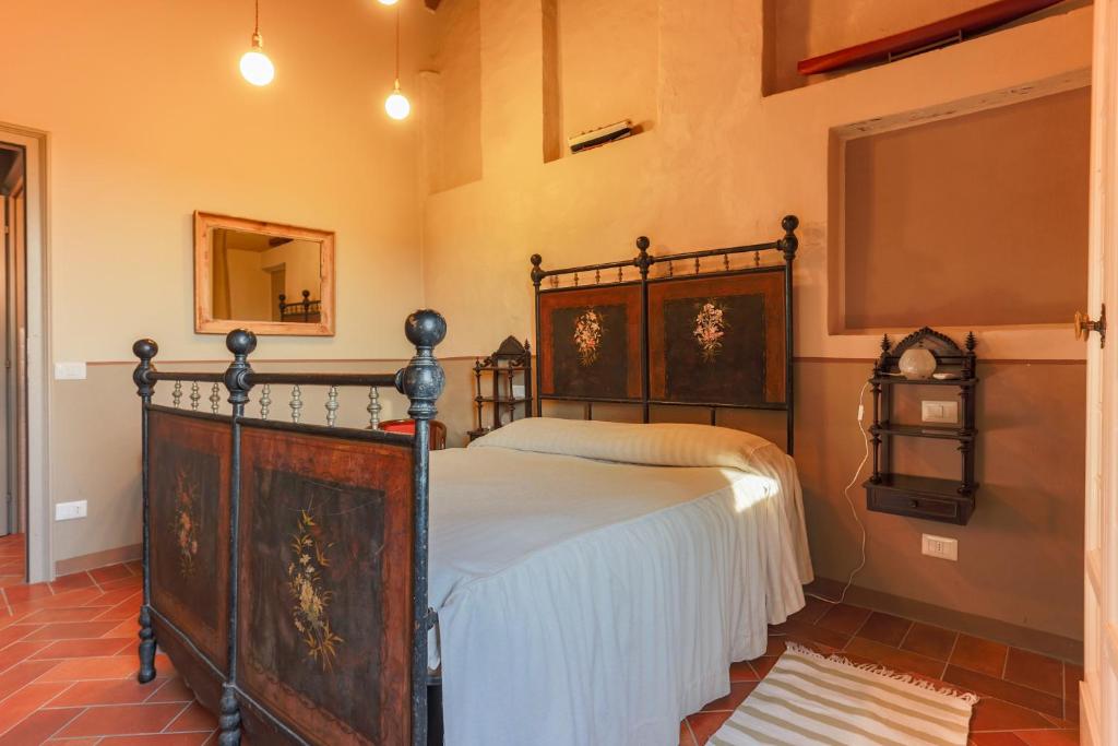 Postel nebo postele na pokoji v ubytování AGRITURISMO LE CORTI DELLA GUALDANA