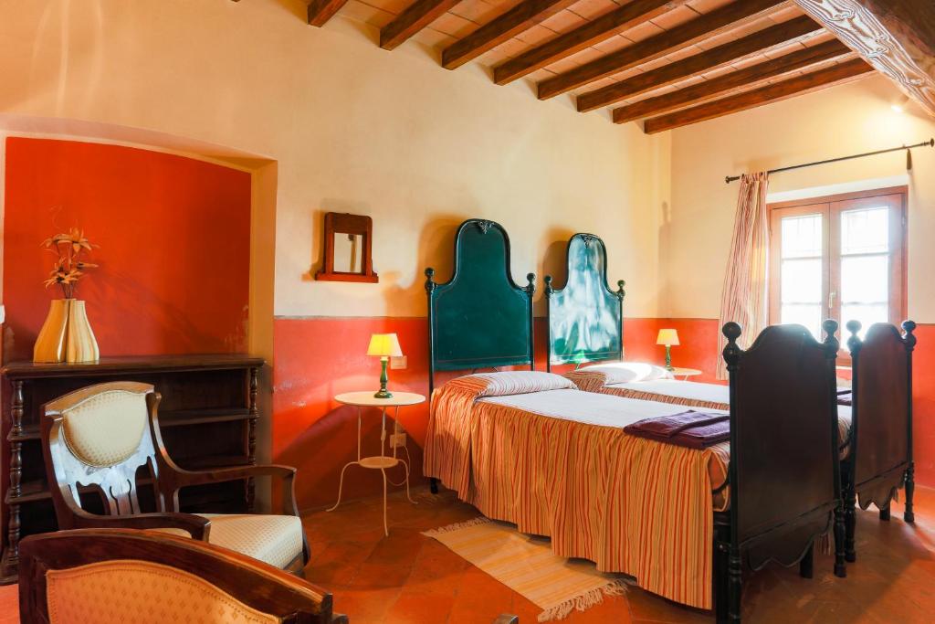 Postel nebo postele na pokoji v ubytování AGRITURISMO LE CORTI DELLA GUALDANA