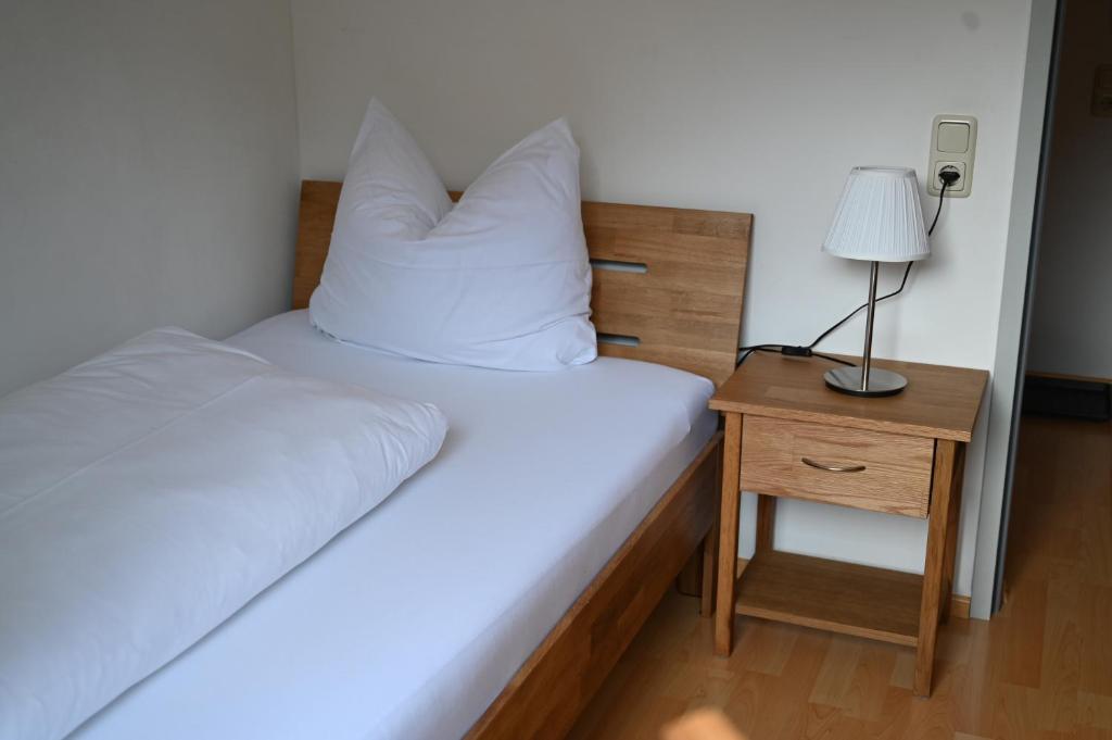 Postel nebo postele na pokoji v ubytování Ferienwohnung Allmein Top 2