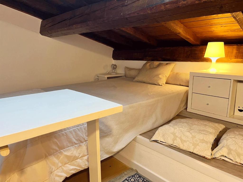 Postel nebo postele na pokoji v ubytování Casa Vacanze L'Acquerello