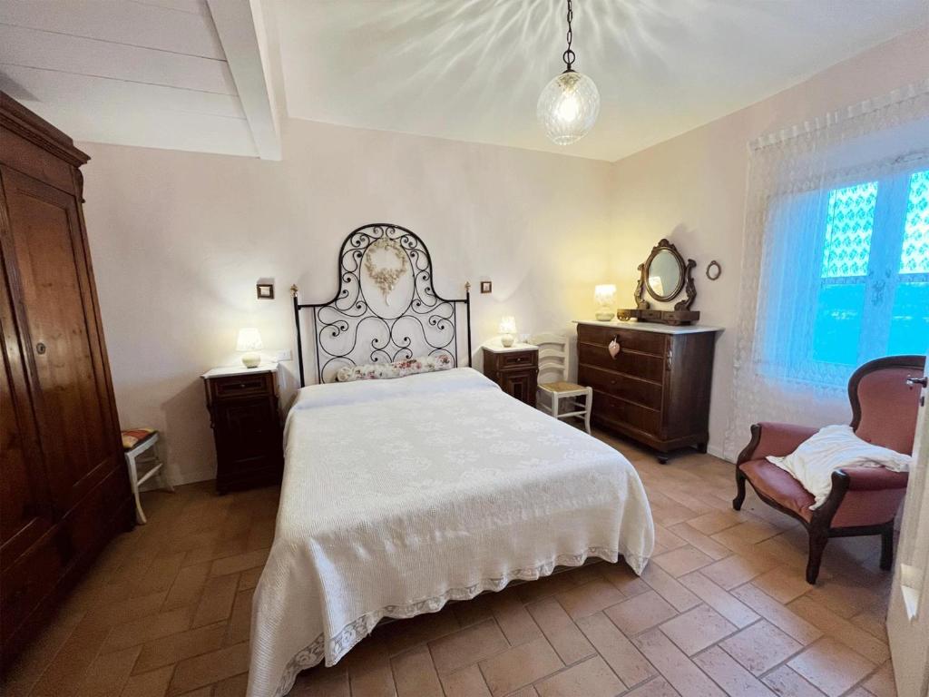 Postel nebo postele na pokoji v ubytování Casa Vacanze L'Acquerello