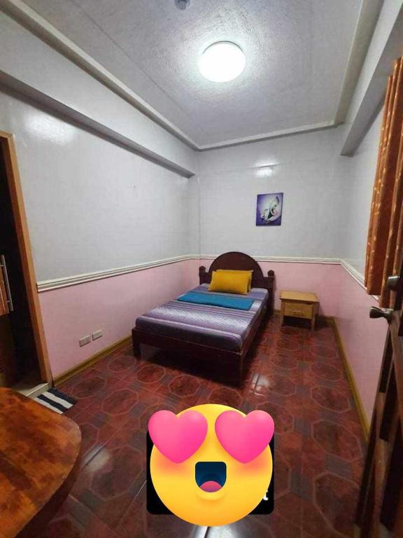 Postel nebo postele na pokoji v ubytování ASHBURN'S TRANSIENT BAGUIO-DORMITORY 6th floor