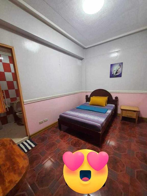 Postel nebo postele na pokoji v ubytování ASHBURN'S TRANSIENT BAGUIO-DORMITORY 6th floor