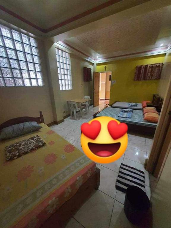 Postel nebo postele na pokoji v ubytování ASHBURN'S TRANSIENT BAGUIO-DORMITORY 6th floor