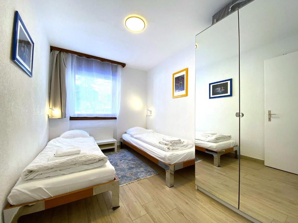 Postel nebo postele na pokoji v ubytování Steghorn 3