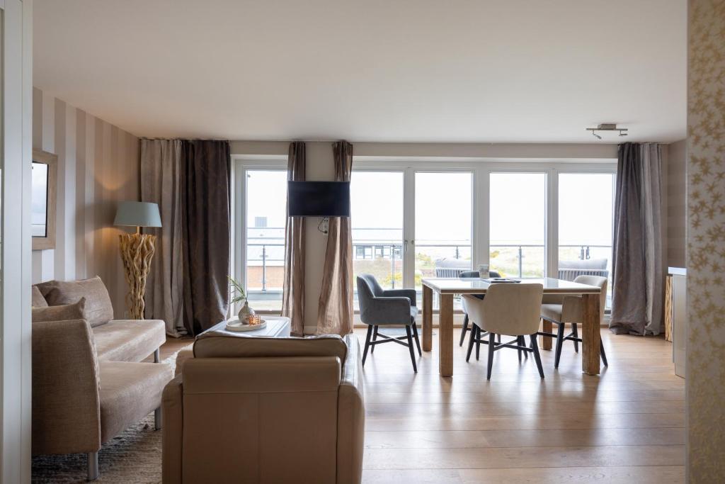 Posezení v ubytování Hotel STRAND am Königshafen