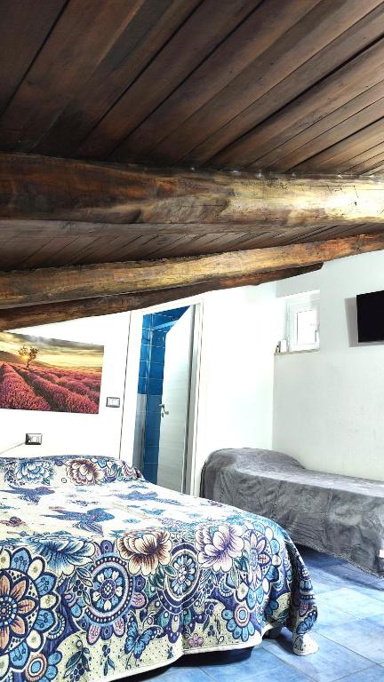 Postel nebo postele na pokoji v ubytování beb centro storico